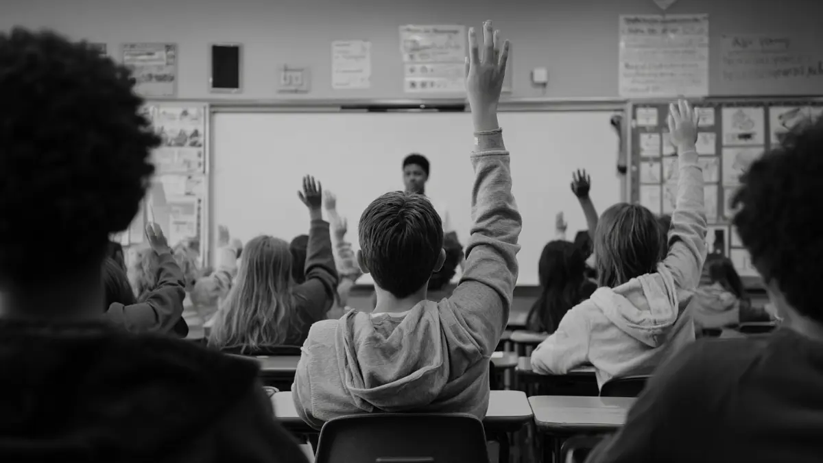 Teacher facing their class at the start of a lesson, ready to take attendance